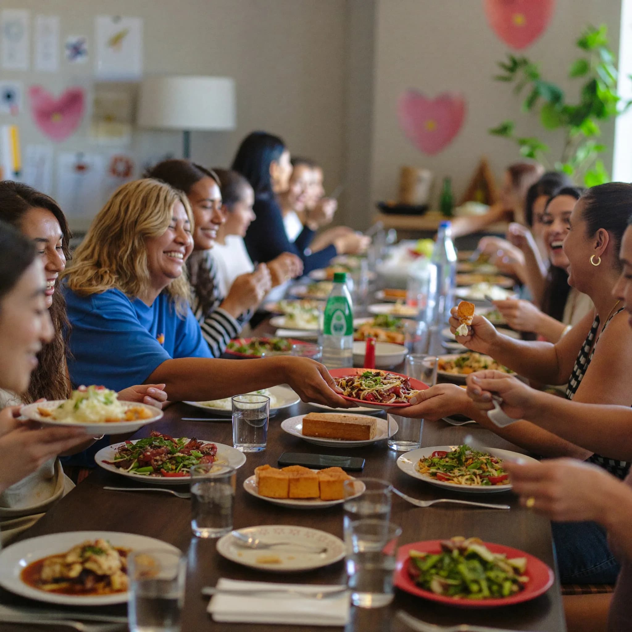 Women sharing a meal together at the end of a cooking session