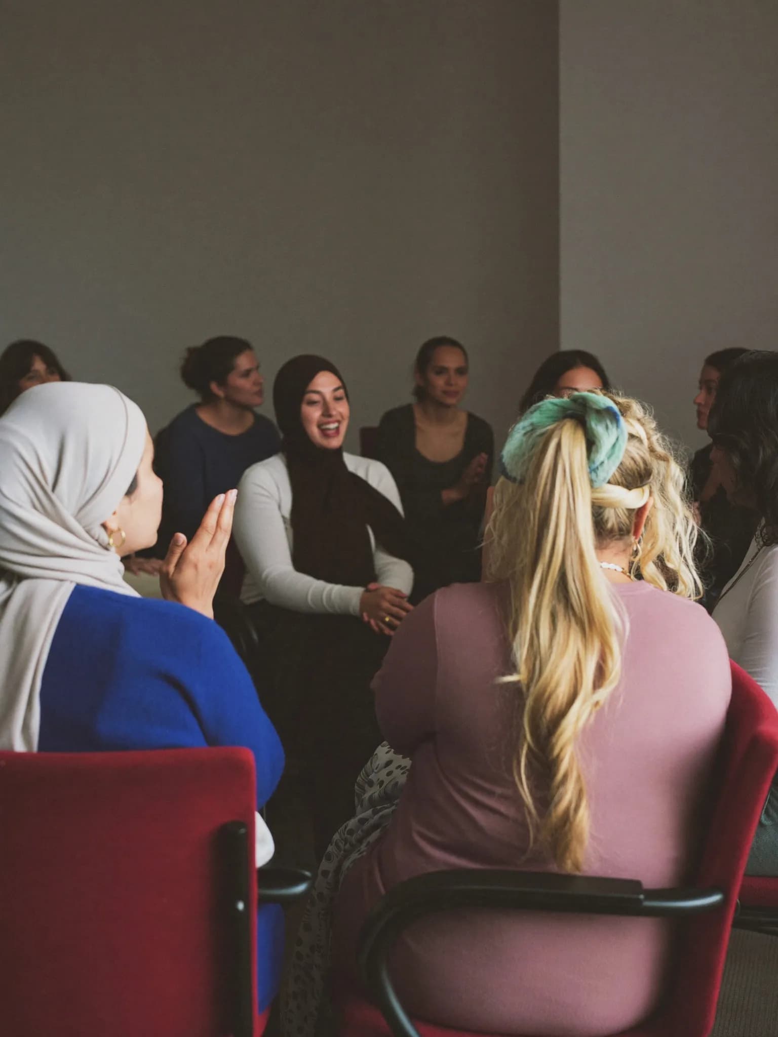 Women sitting together in a circle during a group session